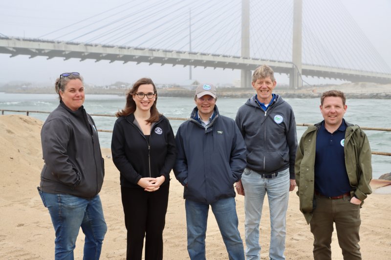 The April tour was an opportunity for DNREC leaders to thank Congresswoman Sarah McBride for securing federal money for the sand bypass project. Shown are (l-r) Kathleen Bergin, DNREC field operation program manager; McBride; DNREC Secretary Greg Patterson; Steve Williams, DNREC director of watershed stewardship; and Josh Lippert, DNREC Shoreline and Waterways Program administrator.